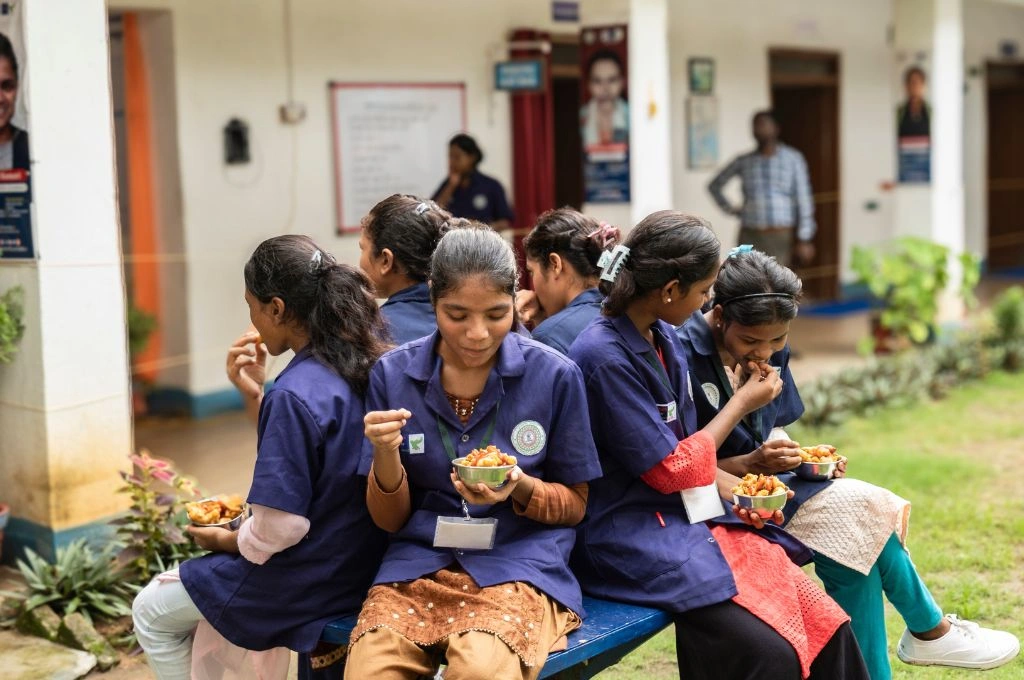 young women trainees enjoying a snack-skill training