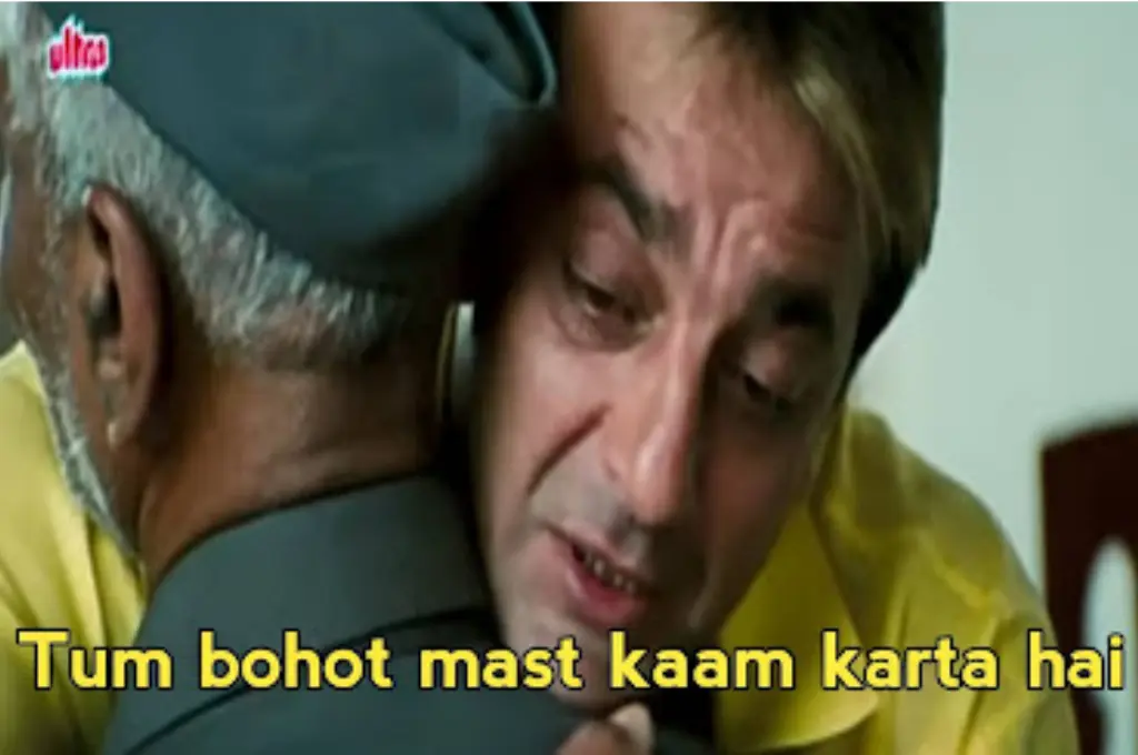 Man hugs another, praising his work_Nonprofit humour