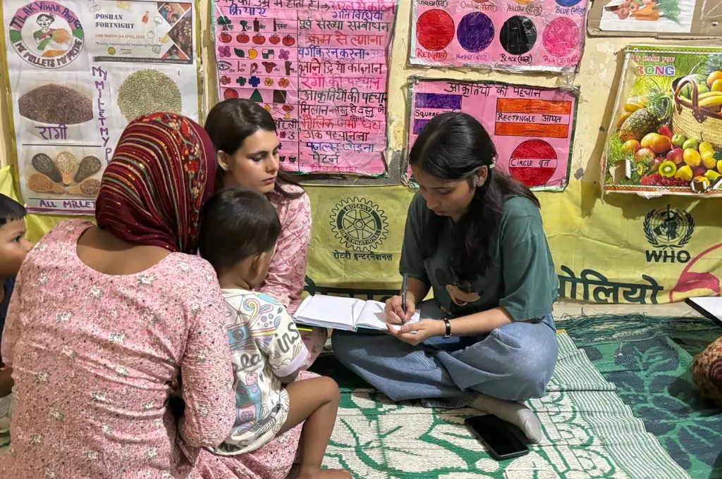 Woman taking notes during community meeting_paralegal assistance