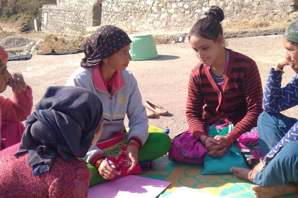 Women in rural meeting or discussion_community for mental health