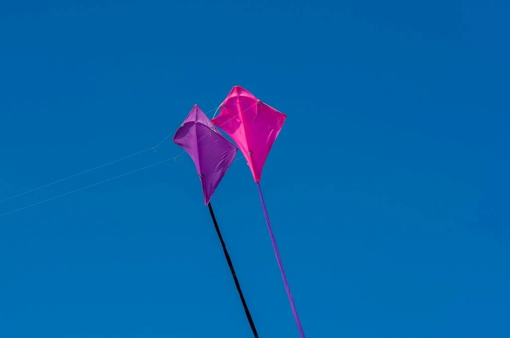 a purple and pink kite flying against a blue sky-Fundraising for nonprofits