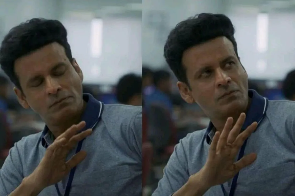 the actor manoj bajpai lifting up one hand as if to say, 