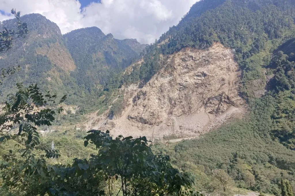 a large scar on a hillside in north Sikkim, possibly as a result of road construction activity--border infrastructure sikkim