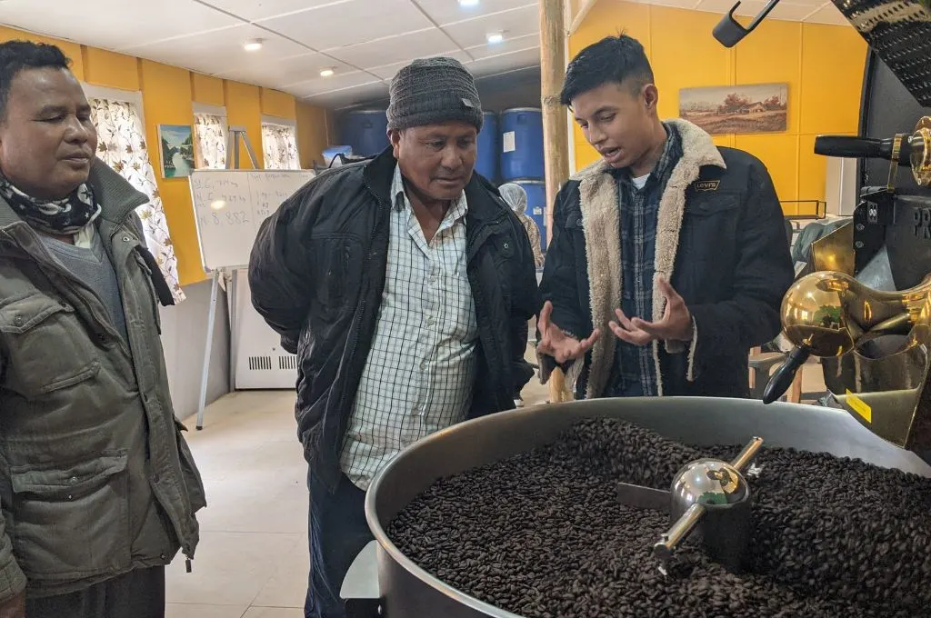 a group of coffee farmers learning how coffee is roasted--start-ups in Meghalaya