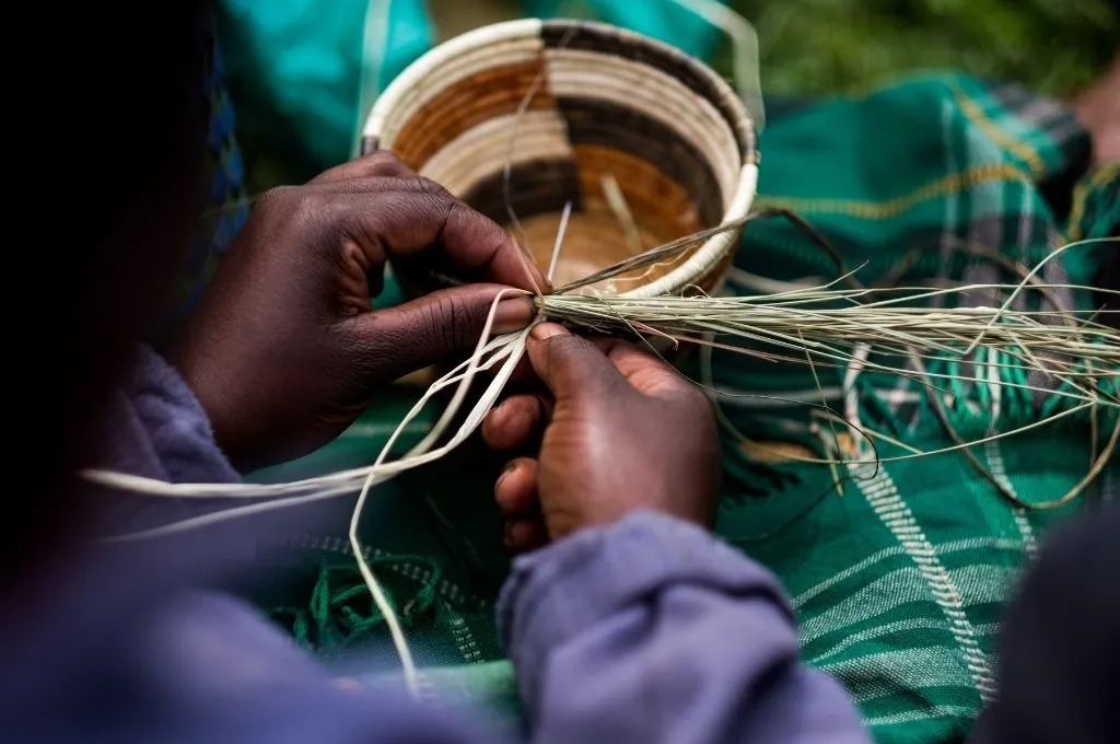 A worker weaving rattan goods--handicraft sector