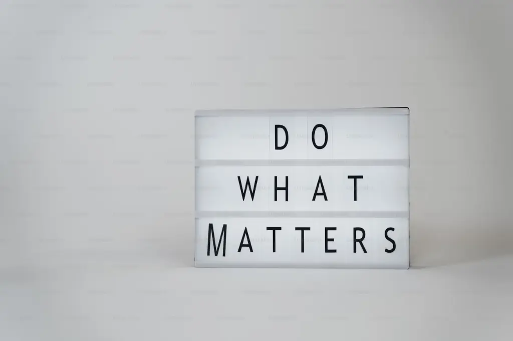 a board with the text "do what matters" against a light background--nonprofit humour