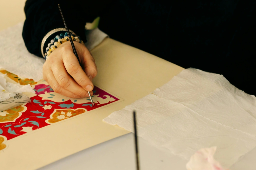 Artist Hand Painting Detailed Design on Paper--patient capital